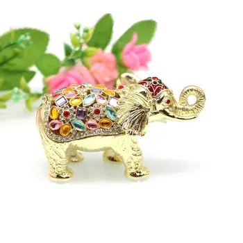 Сувенирная эмаль, инкрустированная бриллиантами, декоративными орнаментами в виде слонов, небольшими украшениями на столешнице из сплава